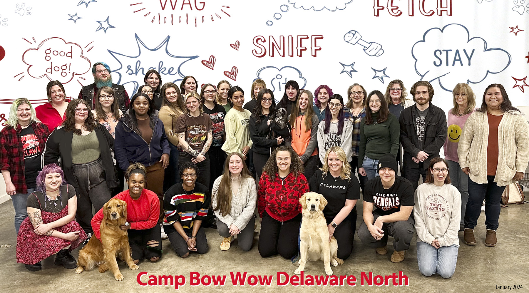 group photo of the Camp Bow Wow Delaware North team
